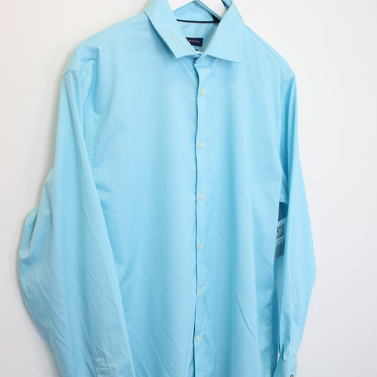 Vintage Tommy Hilfiger shirt in blue. Best fits XL