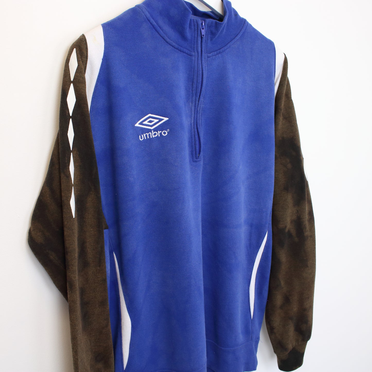 Vintage Umbro quarter zip sweatshirt in blue and brown. Best fits L