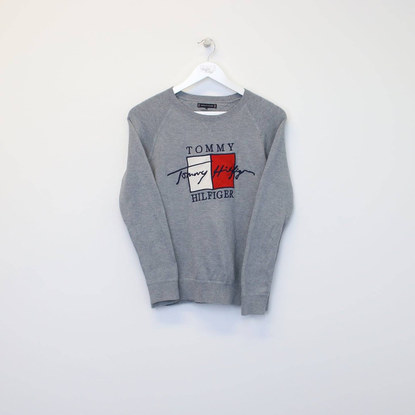 Vintage women's Tommy Hilfiger sweatshirt in grey. Best fits XS