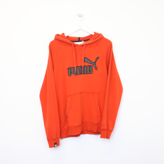 Vintage Puma hoodie in orange. Best fits M