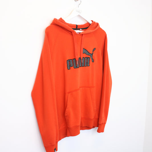 Vintage Puma hoodie in orange. Best fits M