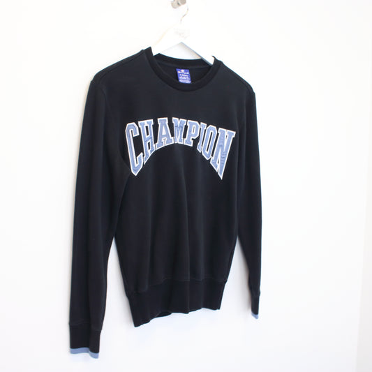 Vintage Champion sweatshirt in black. Best fits XS