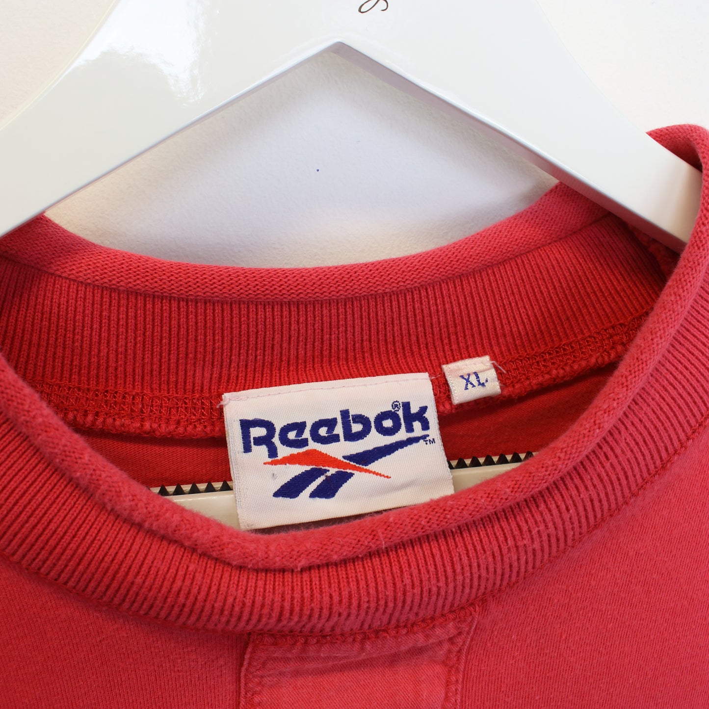 Vintage Reebok t-shirt in red. Best fits L