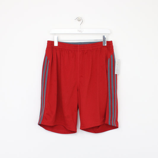 Vintage Adidas shorts in red and grey. Best fits L