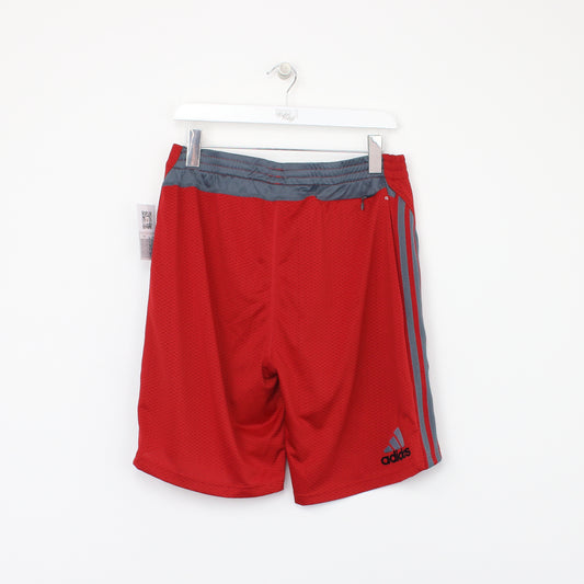 Vintage Adidas shorts in red and grey. Best fits L