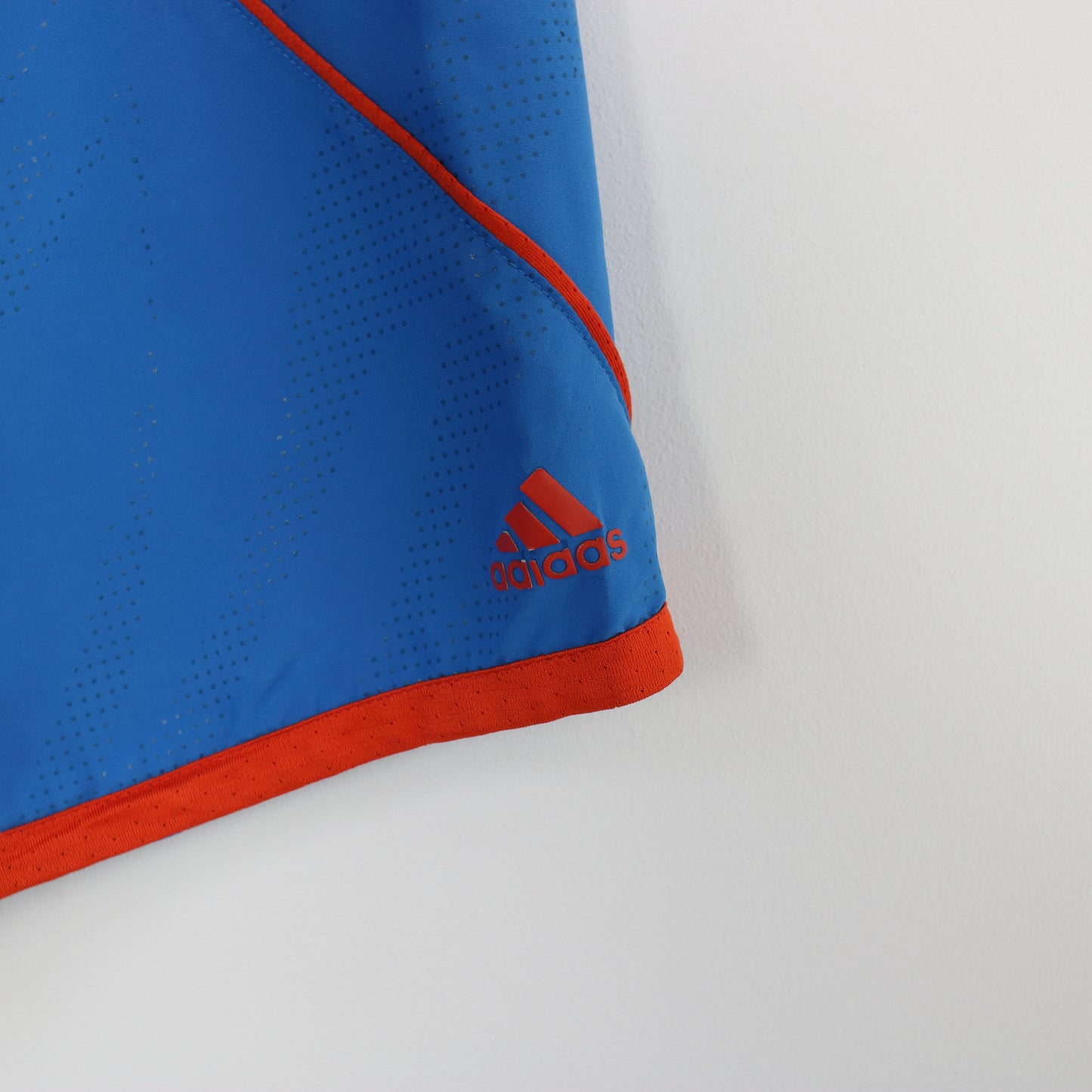 Vintage Adidas shorts in blue and orange. Best fits S