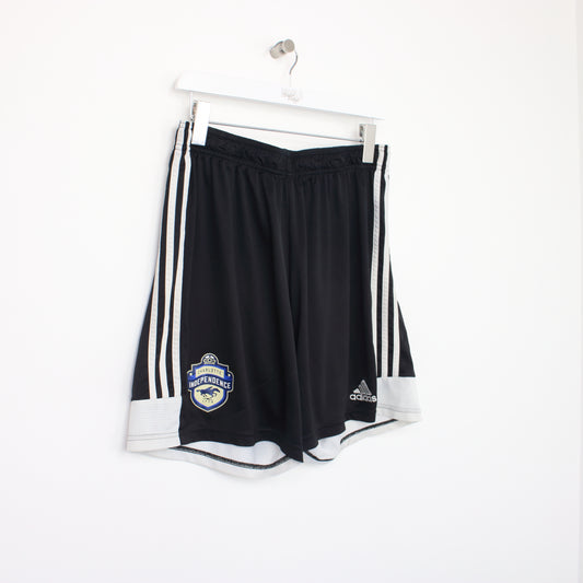 Vintage Adidas Charlotte Independence shorts in black. Best fits XL