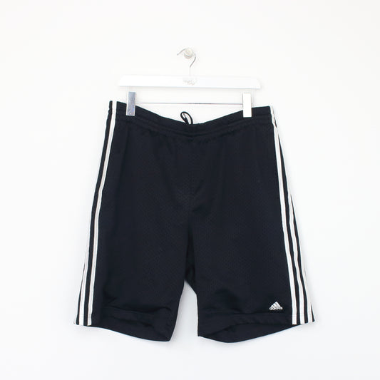 Vintage Adidas shorts in black. Best fits M