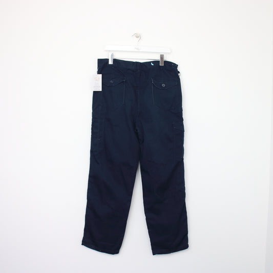 Vintage Dickies carpenter jeans in blue. Best fits W36 L30