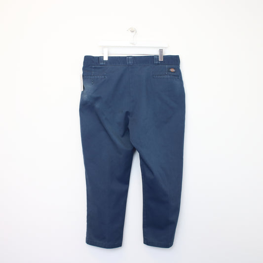 Vintage Dickies trousers in blue. Best fits W40 L27