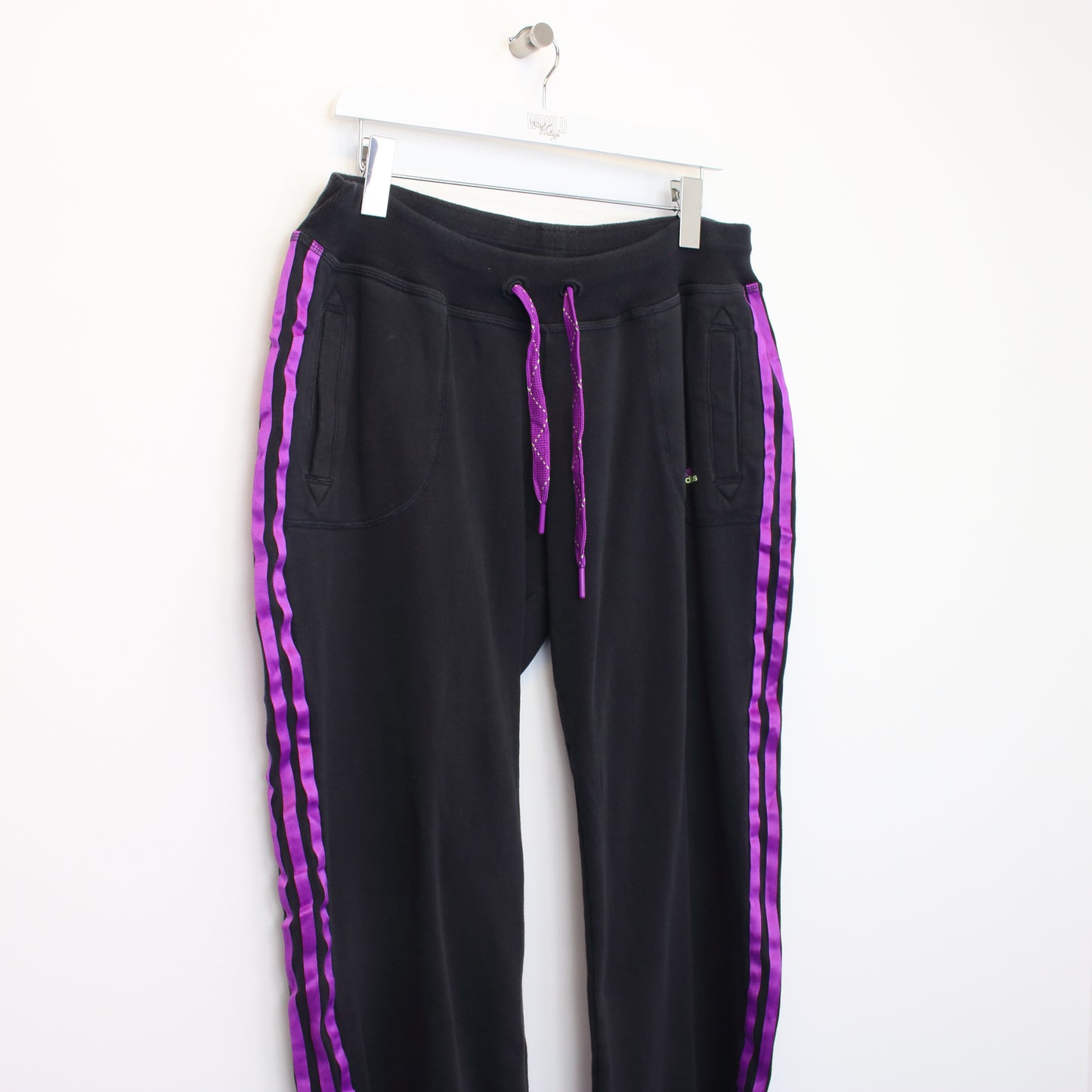 Vintage Women's Adidas joggers in black and purple. Best fits L