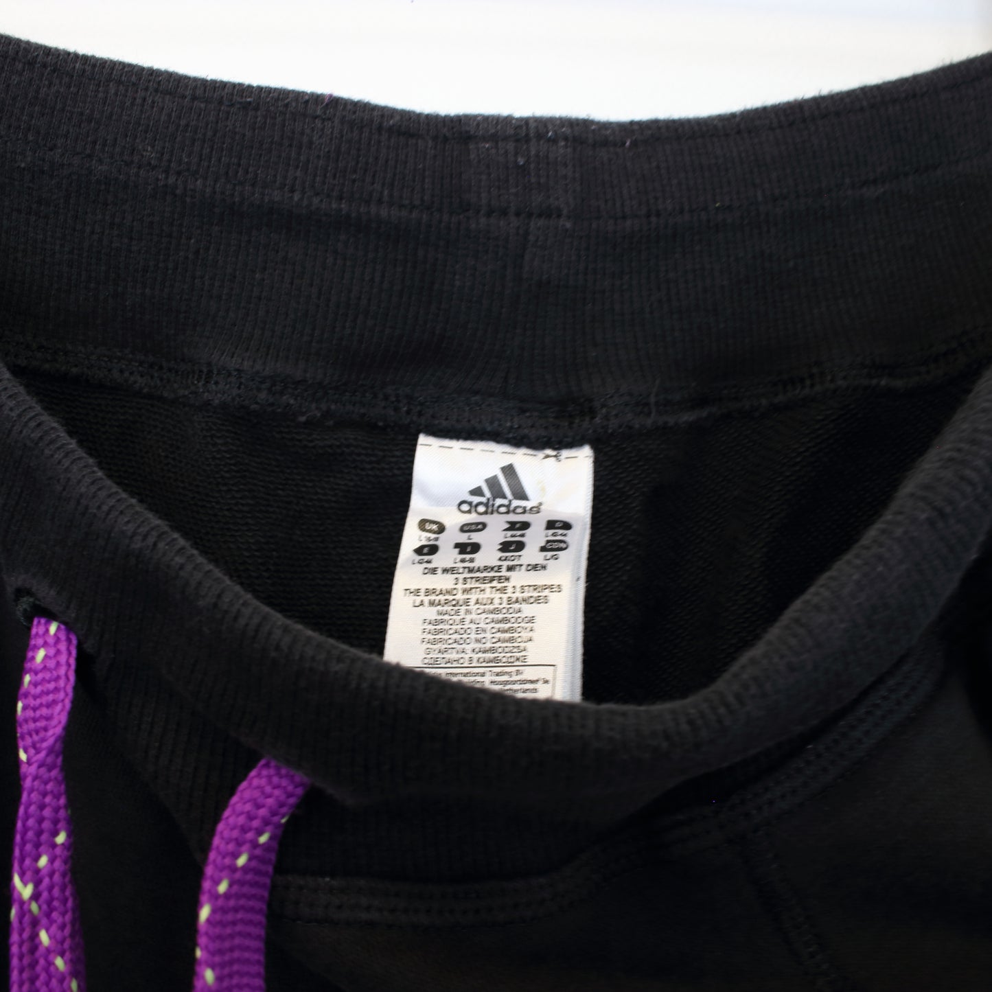 Vintage Women's Adidas joggers in black and purple. Best fits L