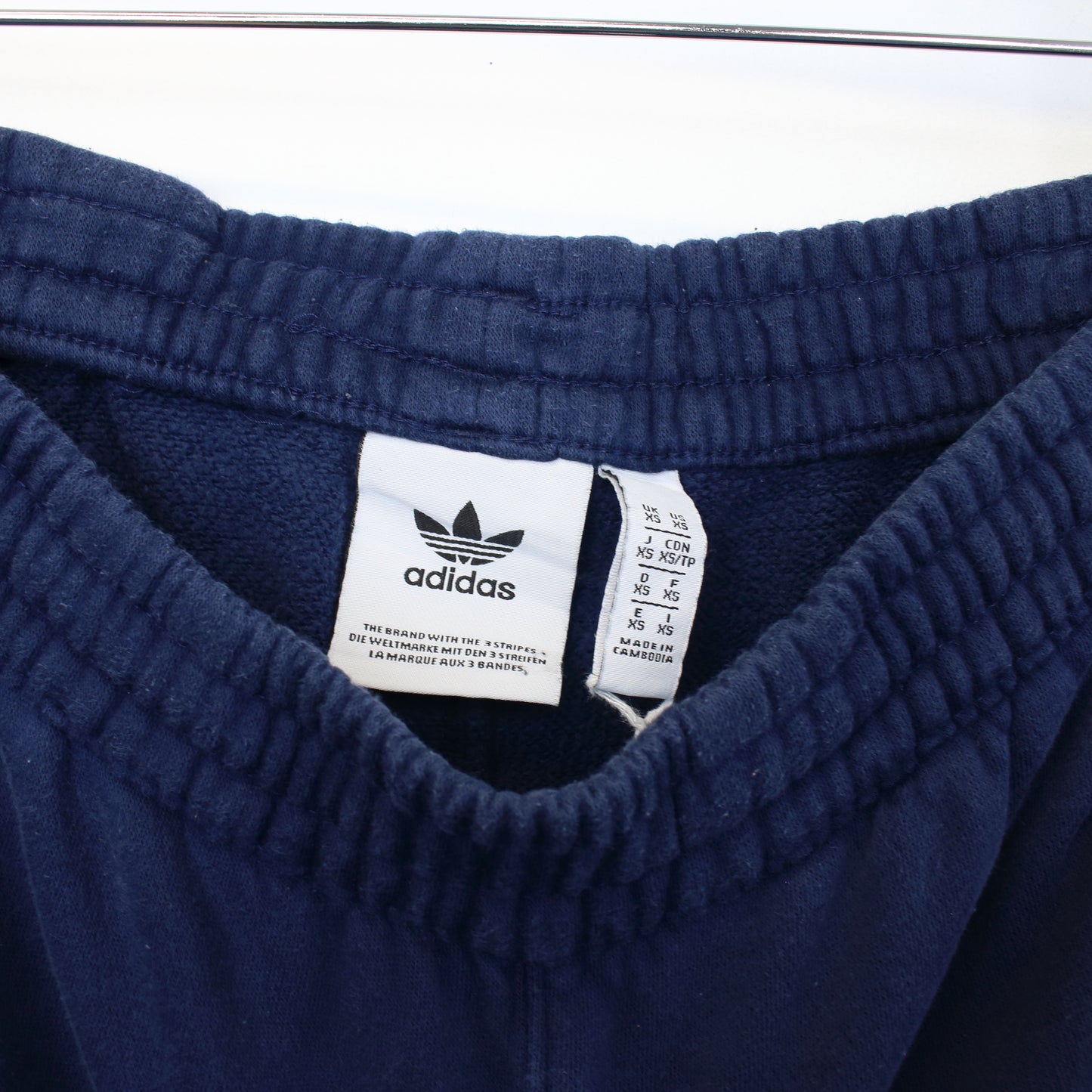 Vintage Adidas joggers in blue and orange. Best fits XS