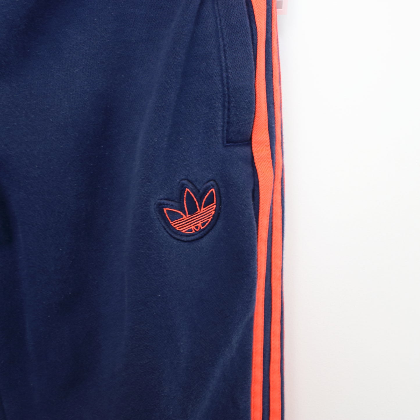 Vintage Adidas joggers in blue and orange. Best fits XS