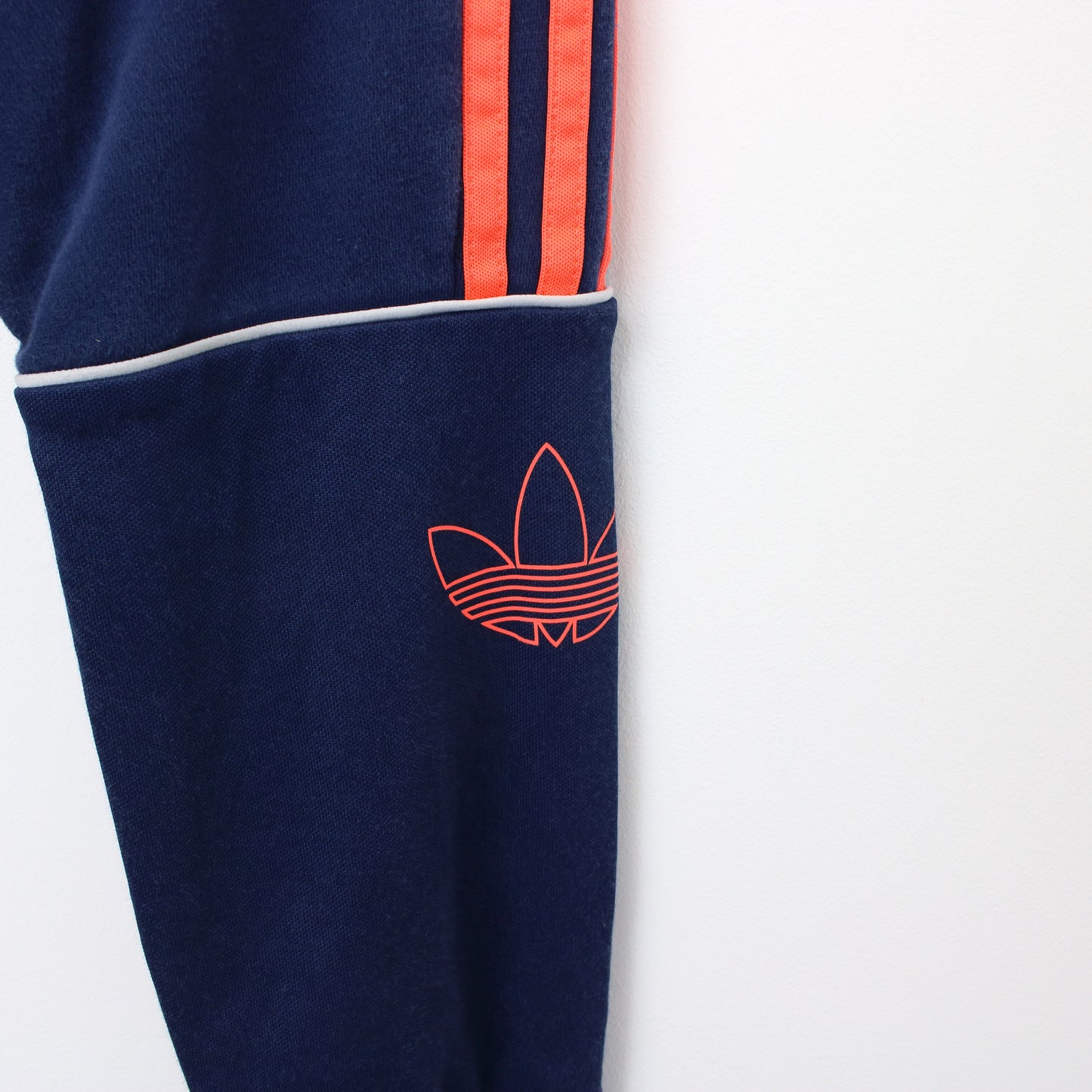 Vintage Adidas joggers in blue and orange. Best fits XS