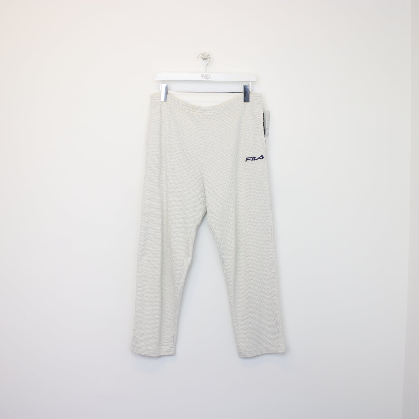 Vintage Women's FILA joggers in white. Best fits size 14