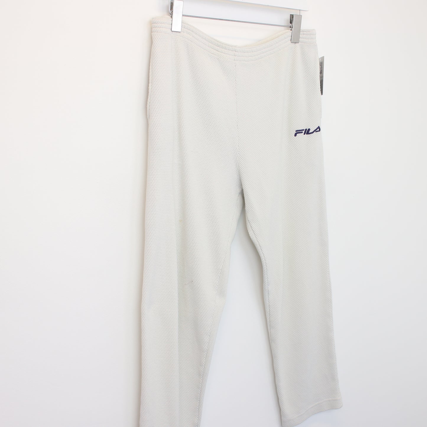 Vintage Women's FILA joggers in white. Best fits size 14