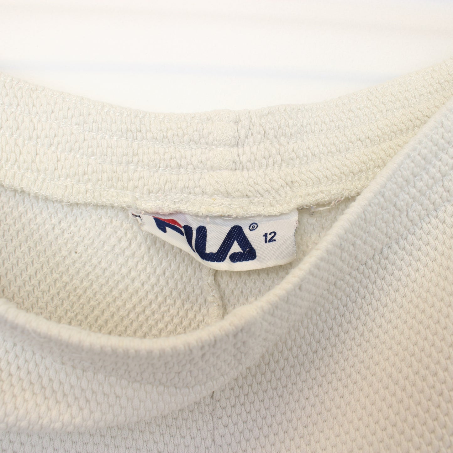 Vintage Women's FILA joggers in white. Best fits size 14