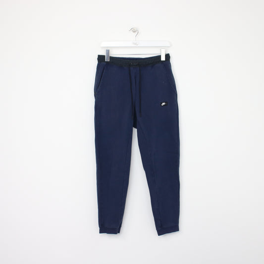 Vintage Nike joggers in blue. Best fits S