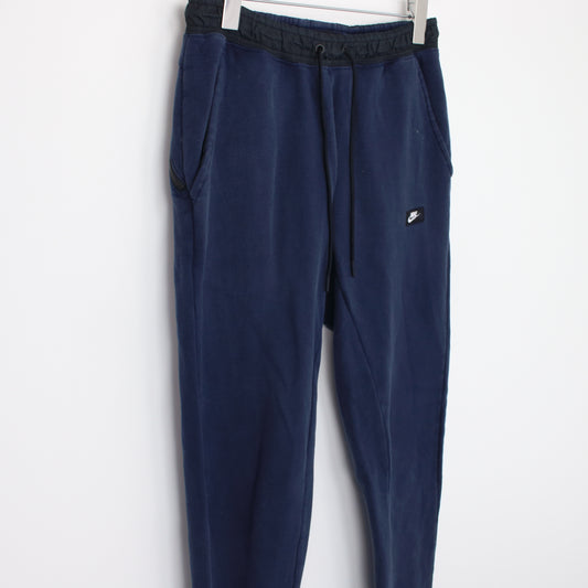 Vintage Nike joggers in blue. Best fits S