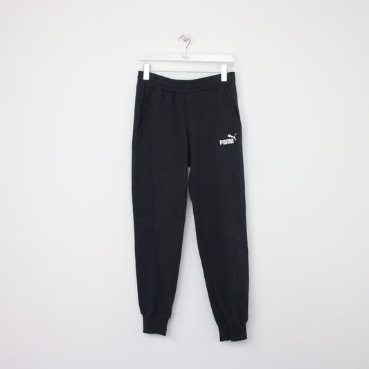 Vintage Puma joggers in black. Best fits M