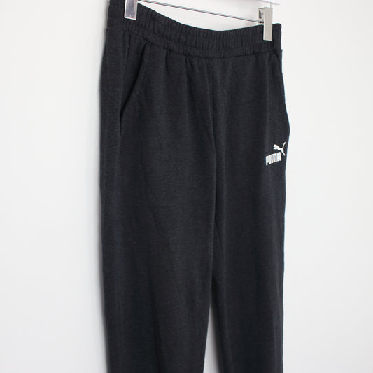 Vintage Puma joggers in black. Best fits M