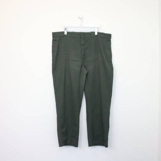 Vintage Dickies 874 original fit trousers in green. Best fits W44