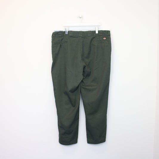 Vintage Dickies 874 original fit trousers in green. Best fits W44