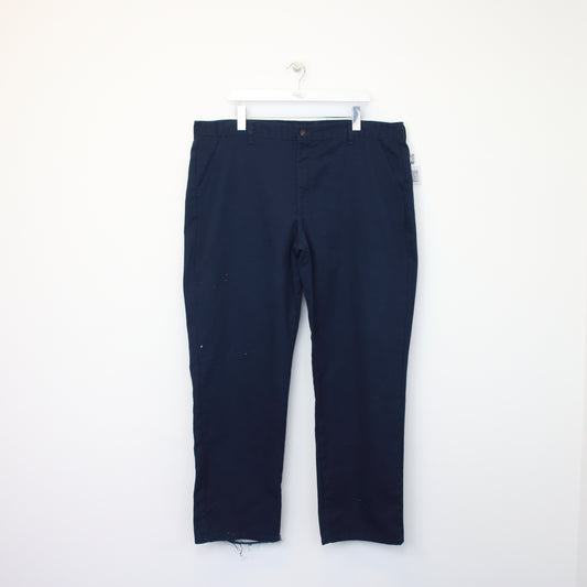 Vintage Dickies trousers in navy blue. Best fits W42