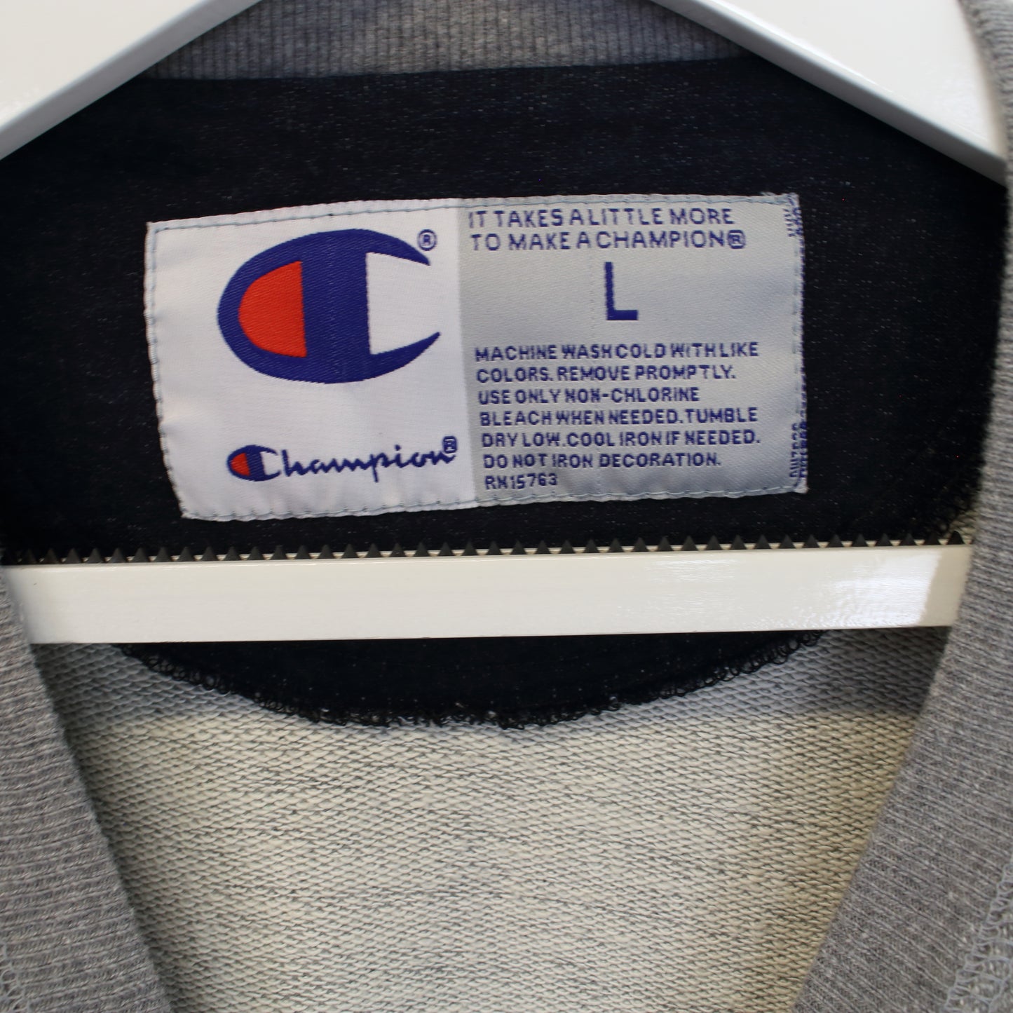 Vintage Champion spell out sweatshirt in grey. Best fits L