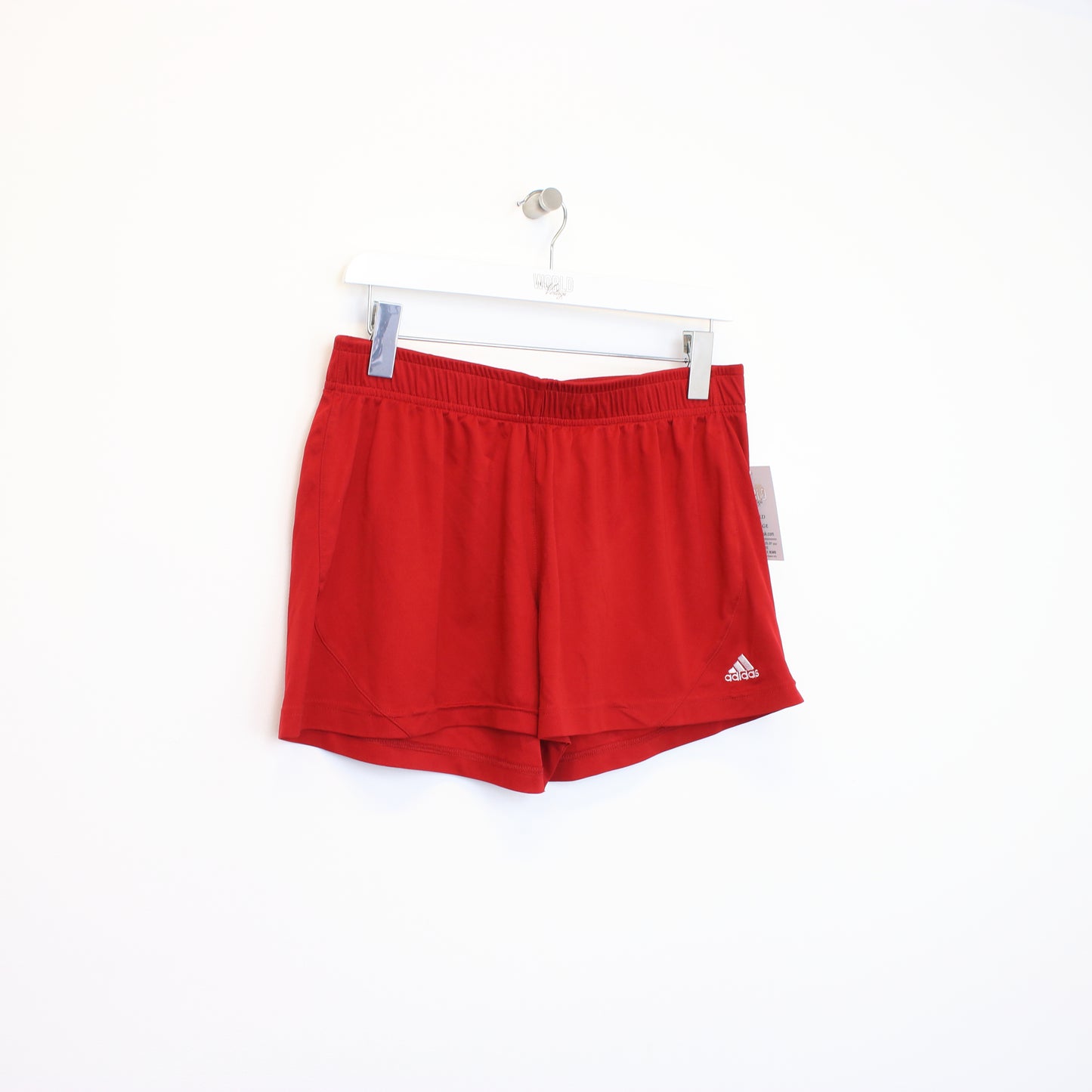 Vintage Adidas shorts in red and white. Best fits L