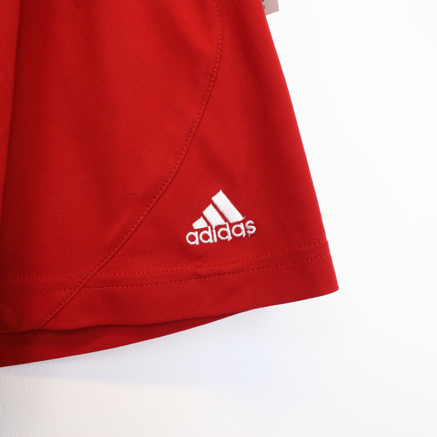 Vintage Adidas shorts in red and white. Best fits L