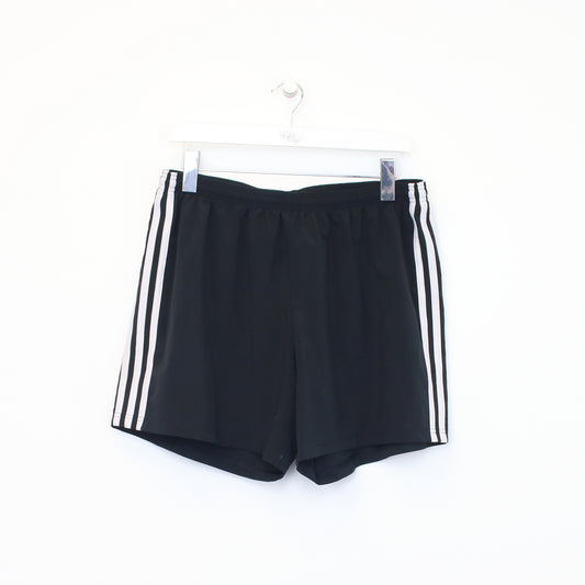 Vintage Adidas shorts in black and white. Best fits XL