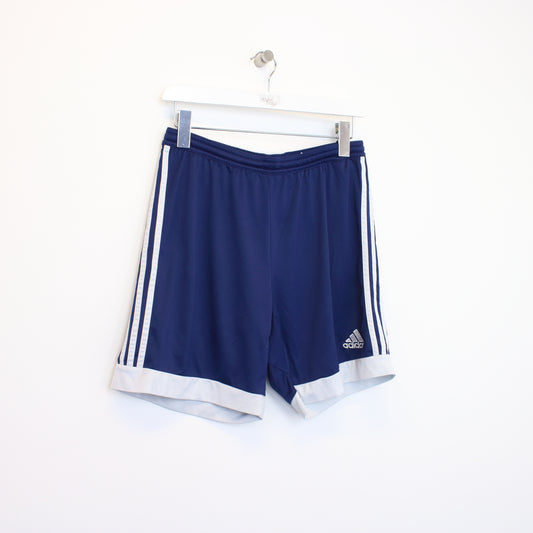 Vintage Adidas shorts in blue and white. Best fits M