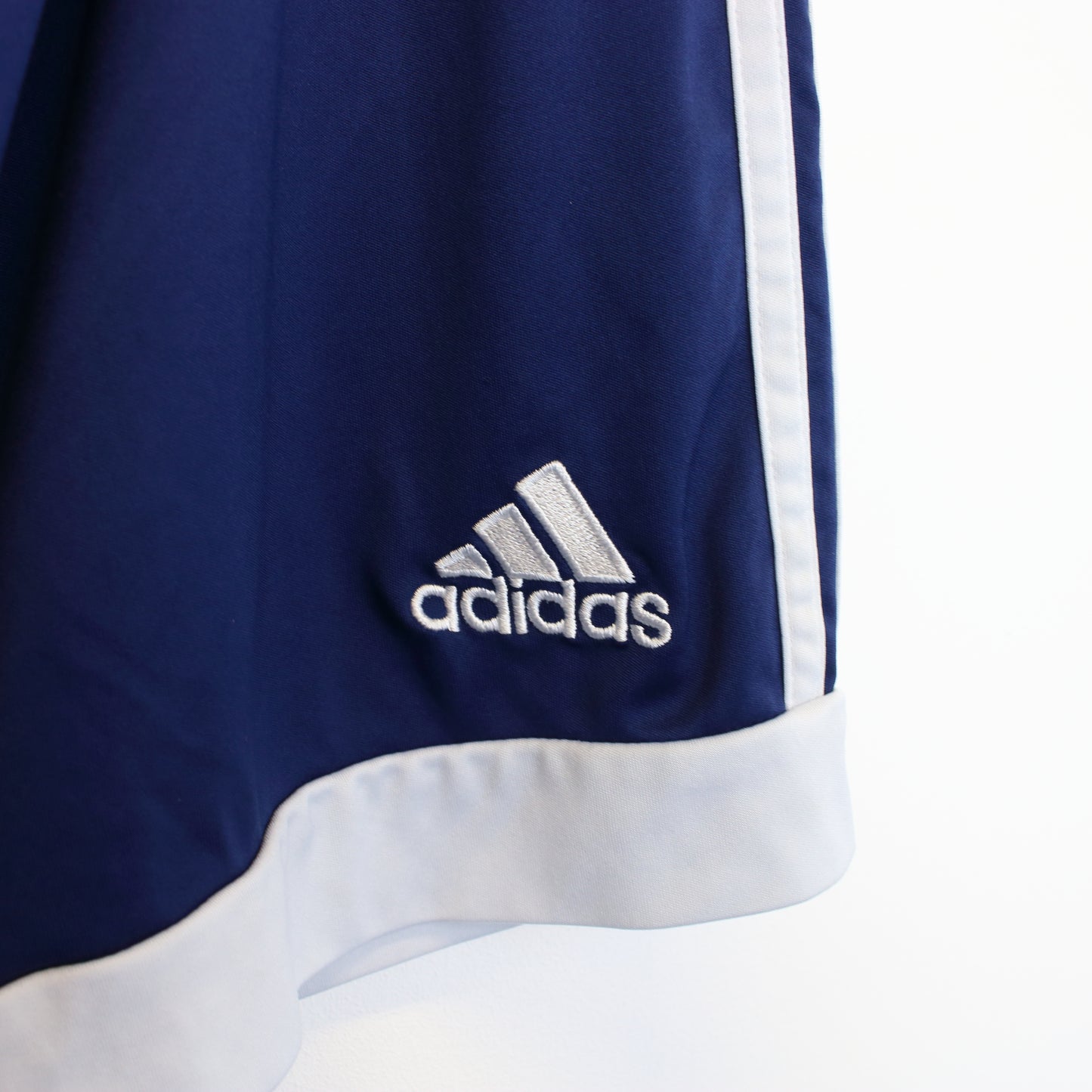 Vintage Adidas shorts in blue and white. Best fits M