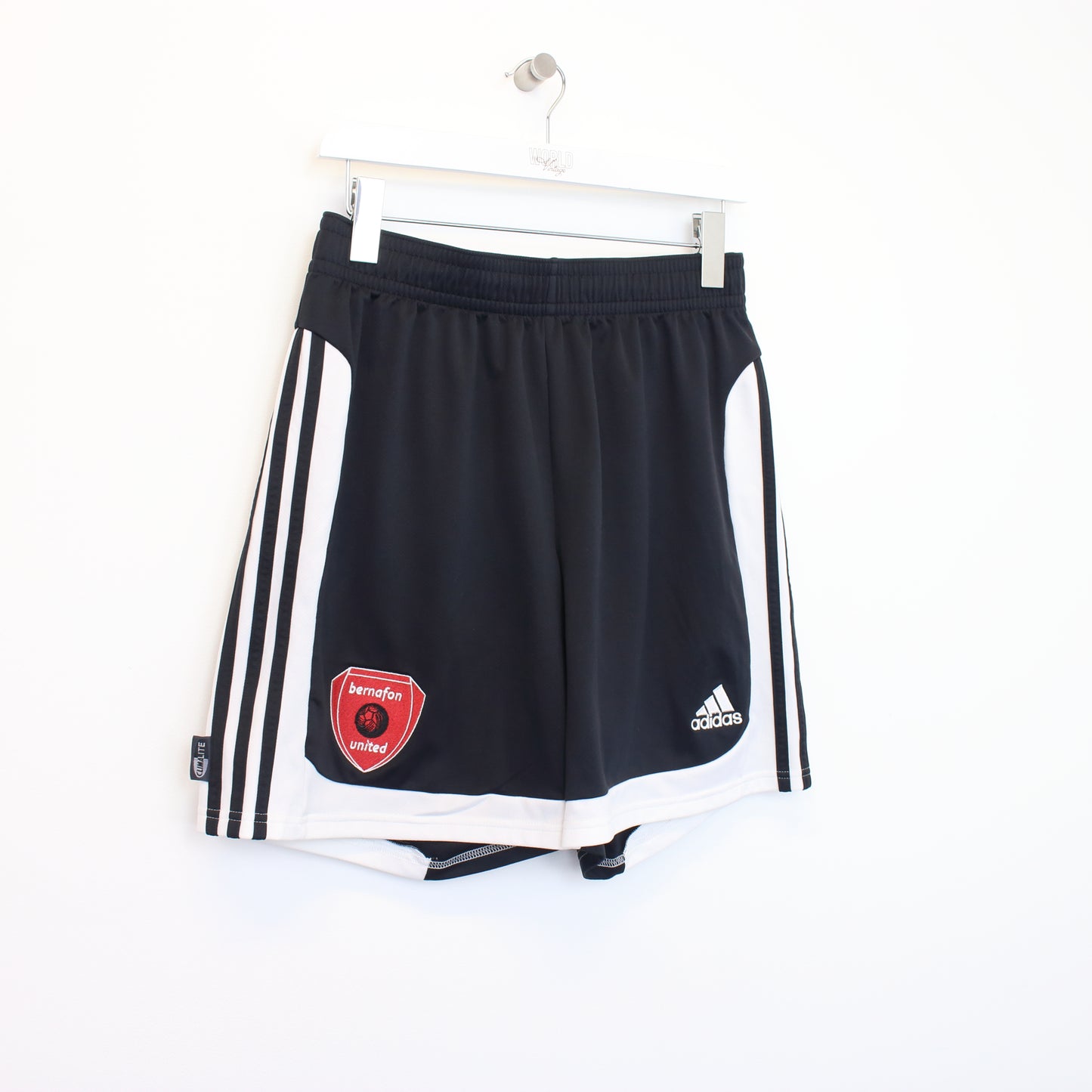 Vintage Adidas shorts in black and white. Best fits L