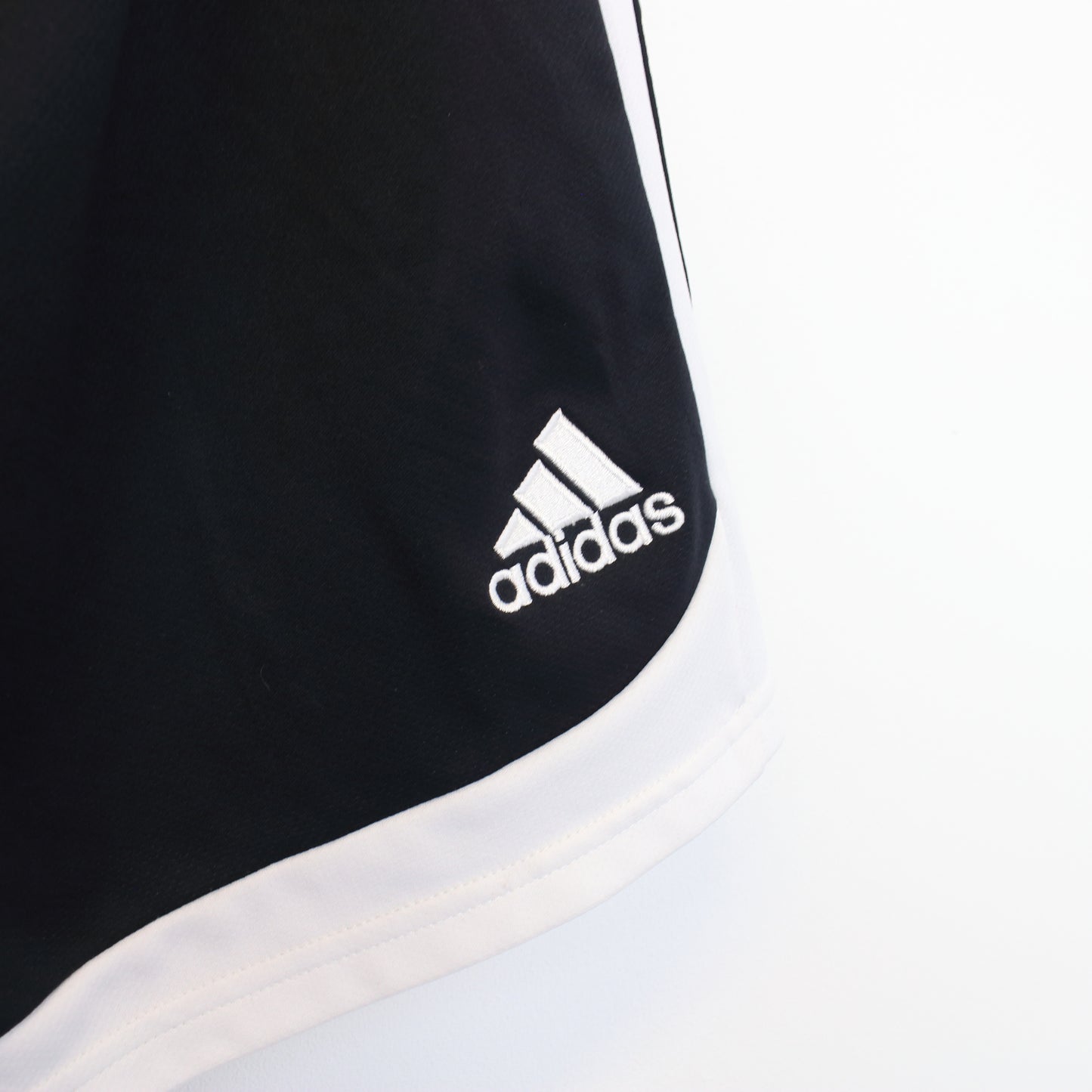 Vintage Adidas shorts in black and white. Best fits L