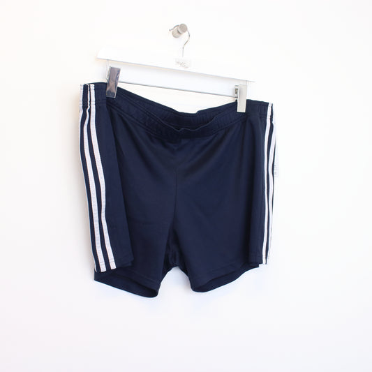 Vintage Adidas shorts in blue and white. Best fits XXL