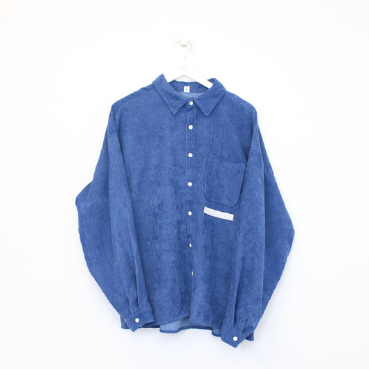 Vintage Judy Shop chord shirt in blue. Bets fits L