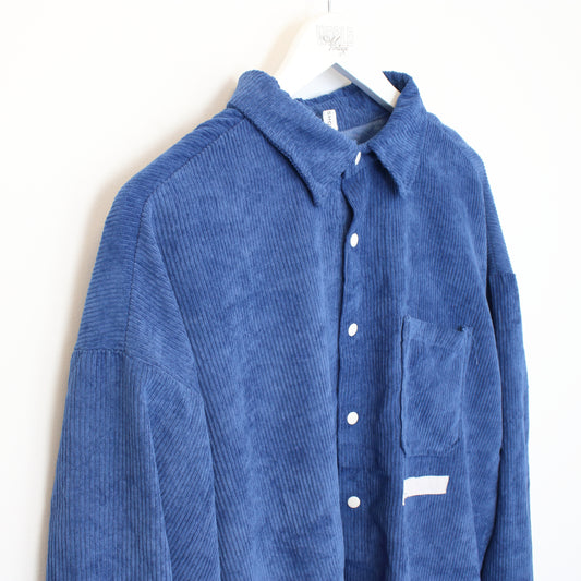 Vintage Judy Shop chord shirt in blue. Bets fits L