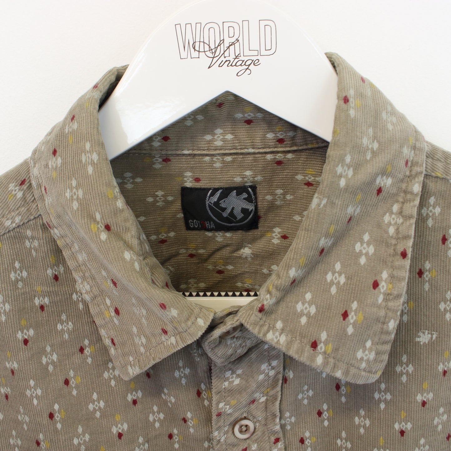 Vintage Gotcha patterned chord shirt in brown. Bets fits L