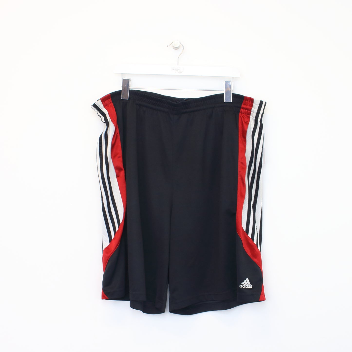 Vintage Adidas shorts in black and red. Best fits XXL