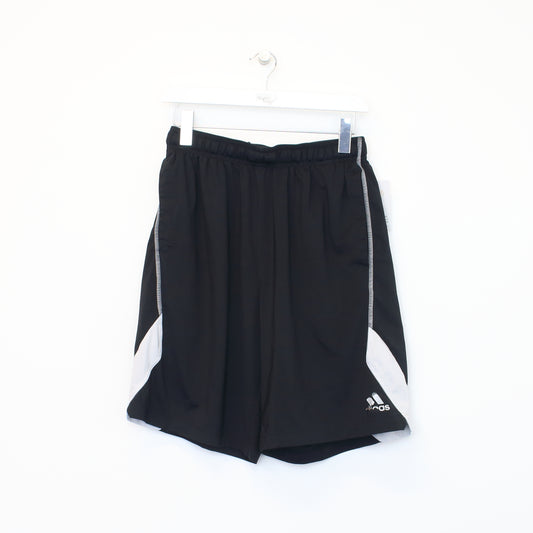 Vintage Adidas shorts in black. Best fits M