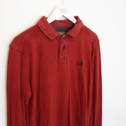 Vintage Timberland sweatshirt in red. Best fits M