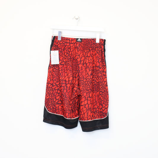 Vintage Adidas animal print shorts in red. Best fits M
