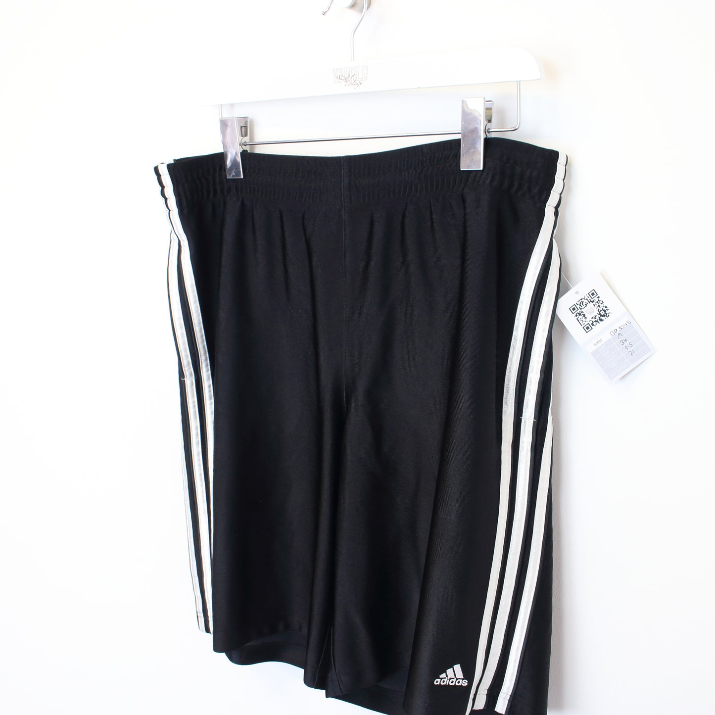 Vintage Adidas shorts in black and white. Best fits L