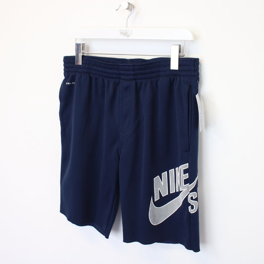 Vintage Nike shorts in navy. Best fits M