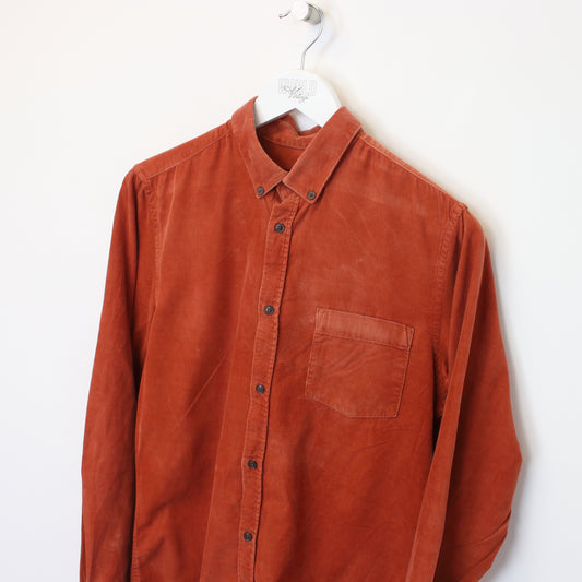 Vintage H&M shirt in orange. Best fits S