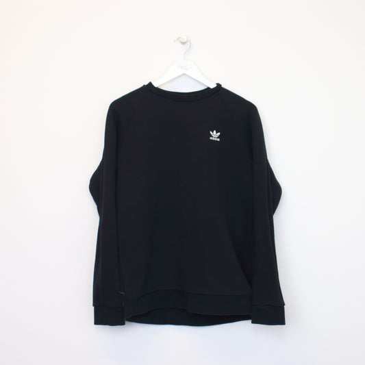 Vintage Adidas sweatshirt in black. Best fits M