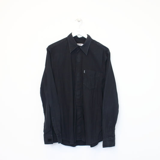 Vintage Moschino shirt in black. Best fits L